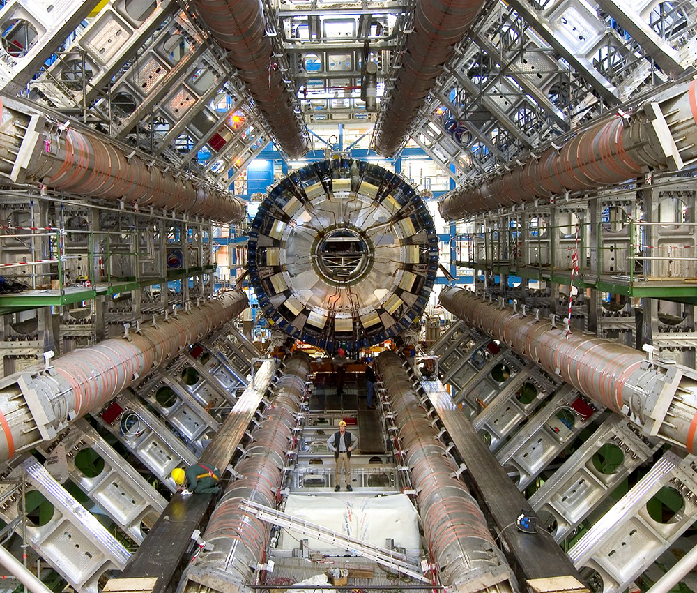 Photo of eight toroid magnets surrounding a calorimeter measuring energies of particles.