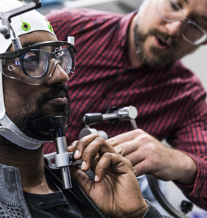 Psychology researchers work in the brain sciences lab.