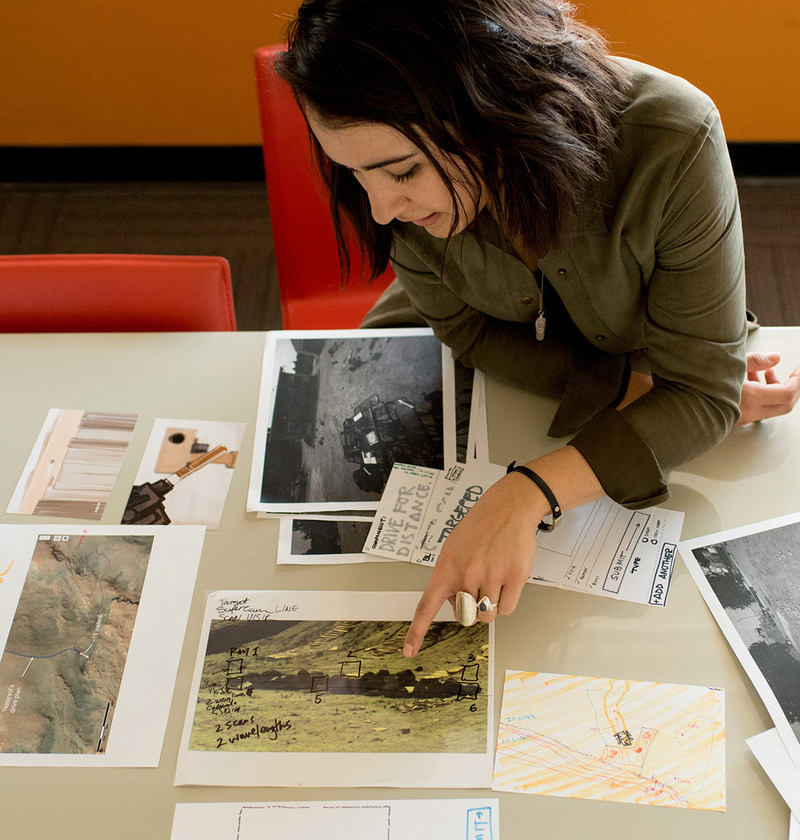 Student showing inspiration photos and research for a project