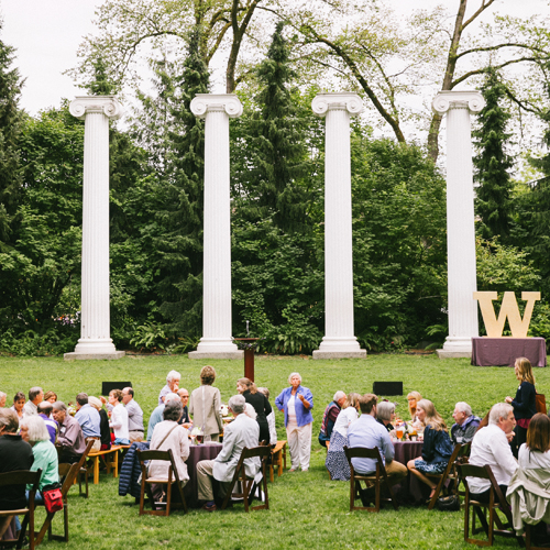 Reception in front of Greek columns on UW campus