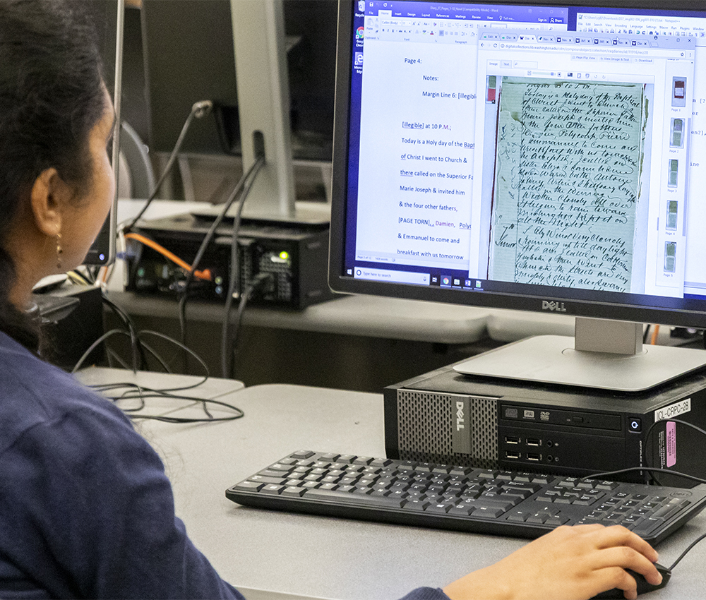 Student looking at computer screen 