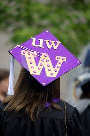 A purple cap on a UW grad.