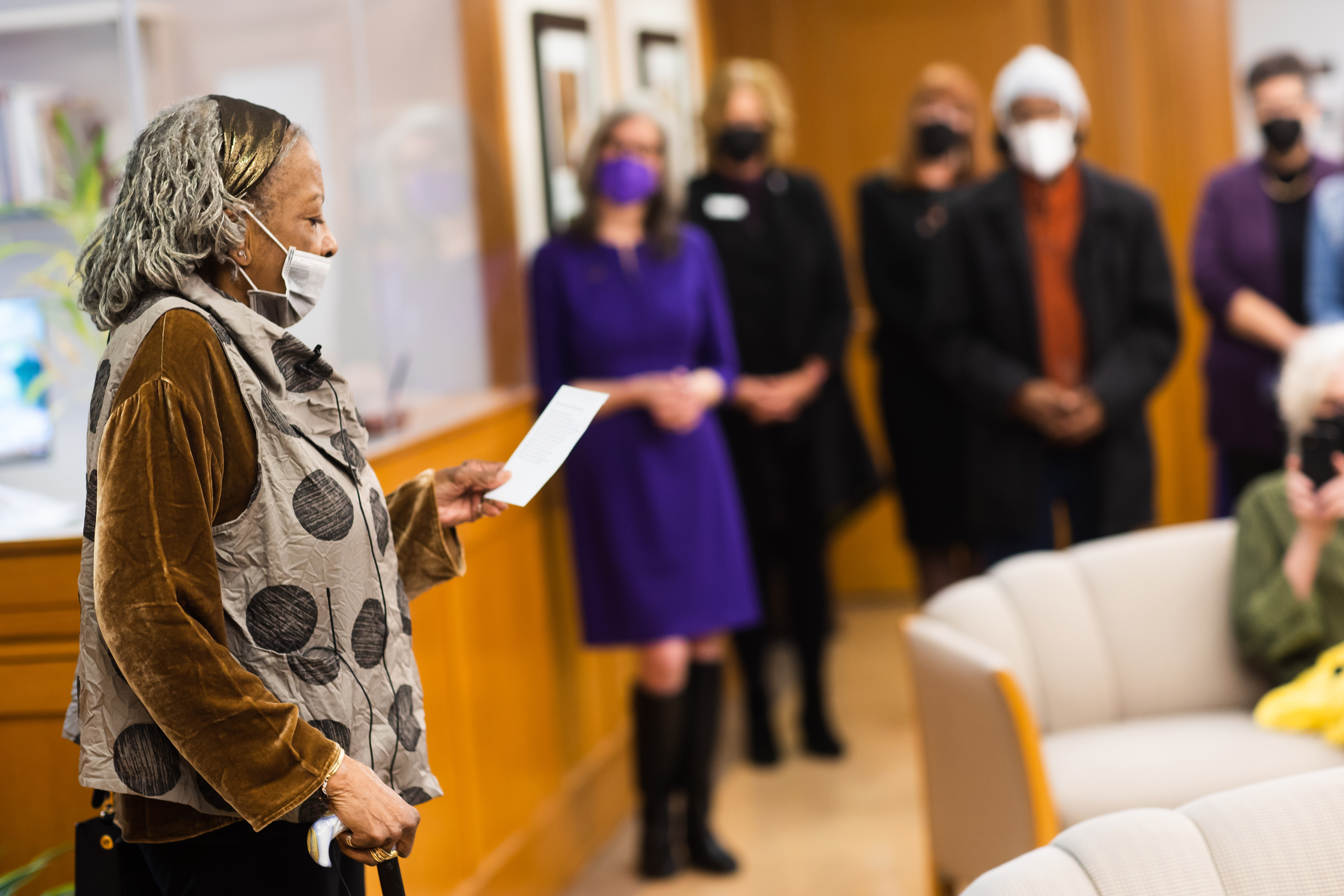 Colleen McElroy recites her poem at the room dedication.